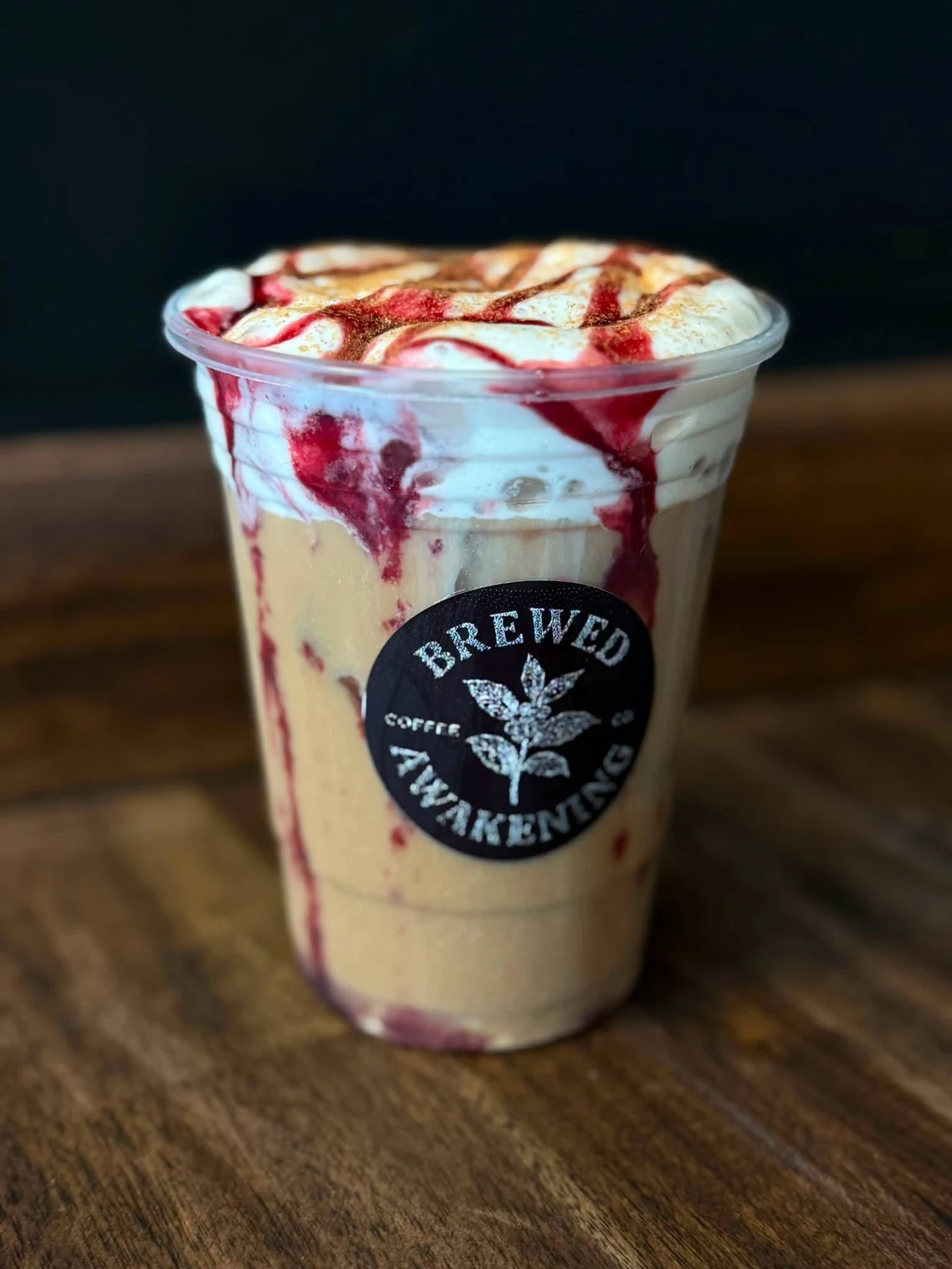 Brewed Awakening Bella Swan berry cobbler cold brew with vanilla cold foam and blackberry drizzle