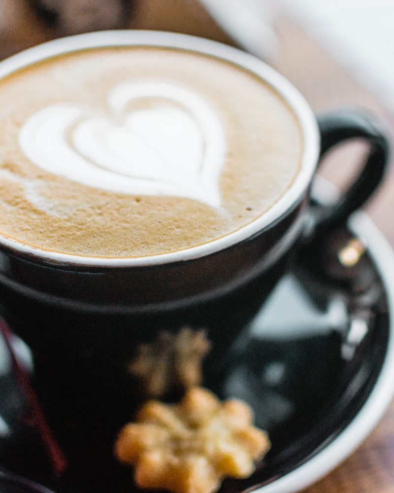 A latte with heart-shaped art