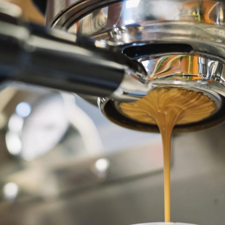 Espresso pouring from a portafilter